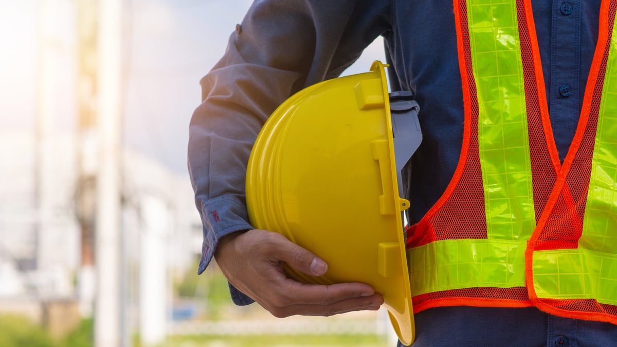 Technician Holding Yellow Hard Hat Safety Hard Hat Sunlight Background